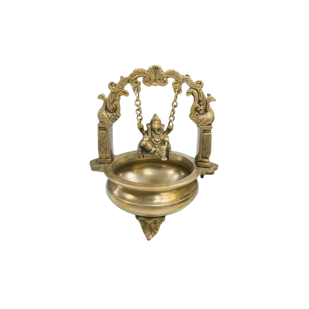 Brass hanging diya (oil lamp) featuring a Ganesha Statue on a swing with peacocks