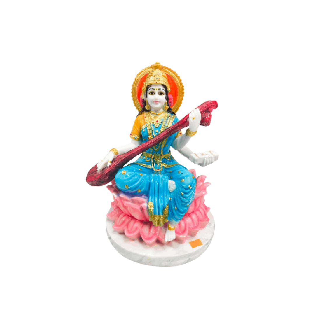 Hindu Goddess Saraswati Statue playing the veena on a pink lotus