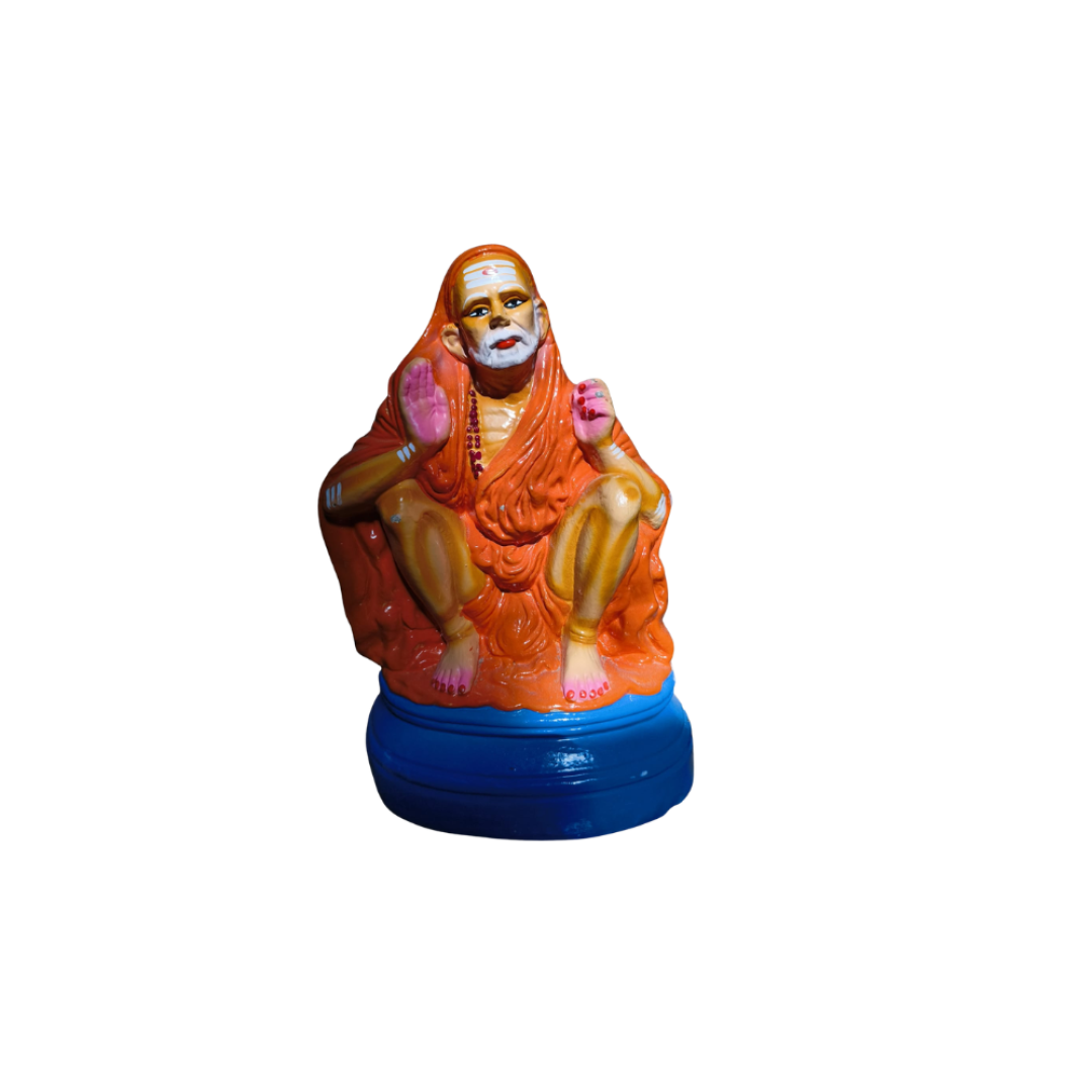 Sai Baba statue (orange robes)