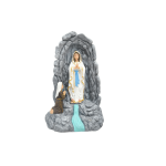 Virgin Mary in a stone grotto Statue with a kneeling figure praying